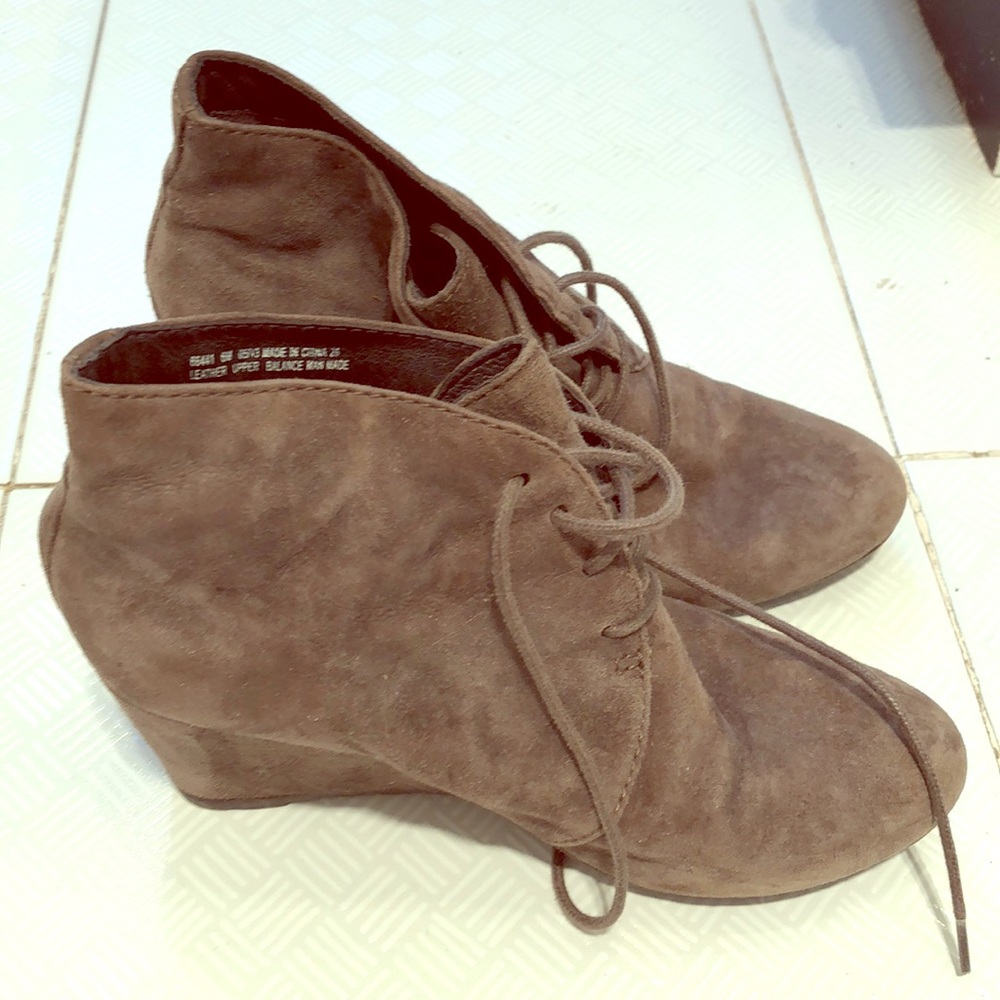 Gray heeled lace up boots